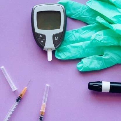 Medical tools including a glucose meter, syringes, and gloves on a purple background—symbolizing insulin resistance, blood sugar monitoring, and diabetes prevention.